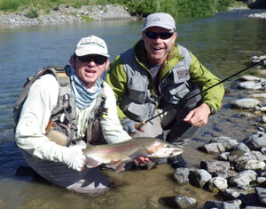 What it's all about, guide and client catching fish!